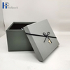 Los complementos personalizados profesionales perfuman la caja de papel gris