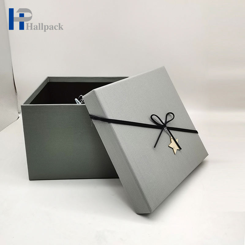 Los complementos personalizados profesionales perfuman la caja de papel gris