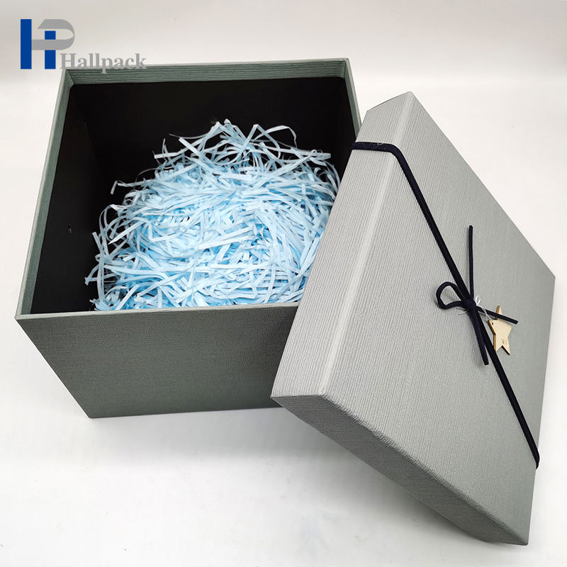 Los complementos personalizados profesionales perfuman la caja de papel gris