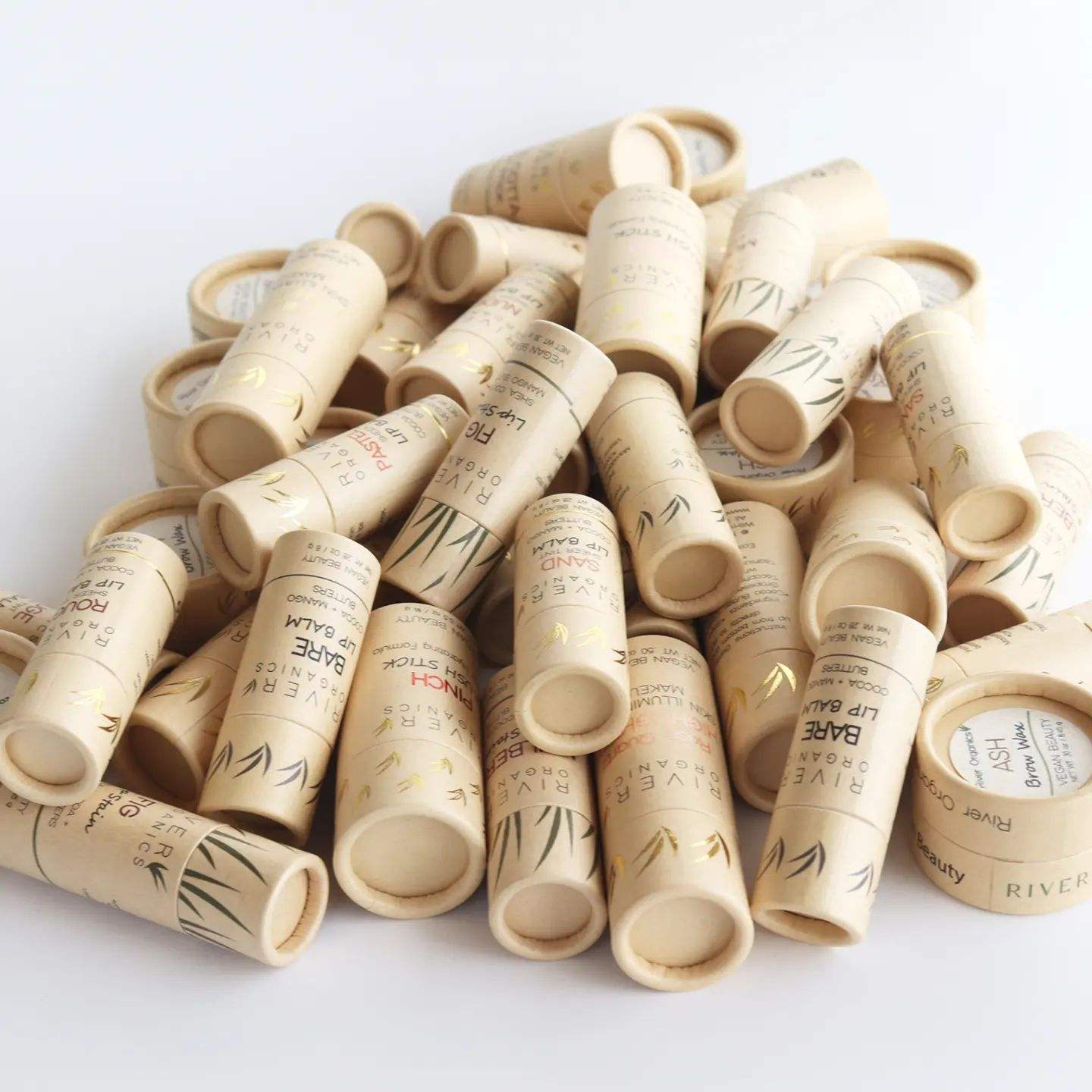 La mejor venta cosmética biodegradable blanca Push Up desodorante en barra embalaje de papel bálsamo labial personalizado tubo giratorio