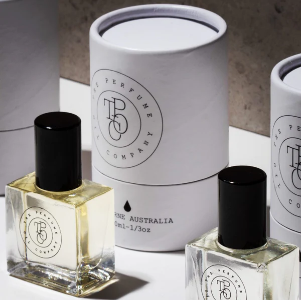 Caja de tubo redondo ecológica de alta calidad para botella de perfume, paquete redondo de cilindro de tubo de embalaje cosmético biodegradable