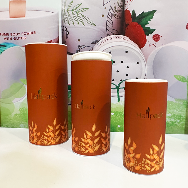 La mano de Hallpack hace el empaquetado redondo del cilindro de papel de la caja del tubo del casquillo plástico de envío biodegradable