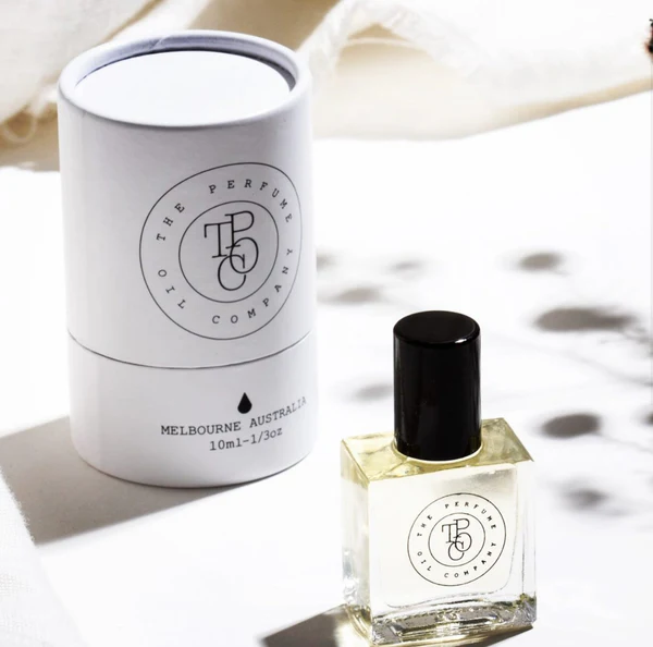 Caja de tubo redondo ecológica de alta calidad para botella de perfume, paquete redondo de cilindro de tubo de embalaje cosmético biodegradable