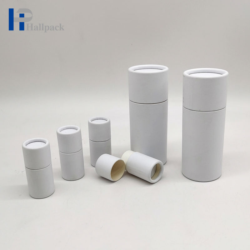Los productos puntuales venden al por mayor el embalaje push-up blanco del tubo redondo del cartón de Kraft para los cosméticos y los artes