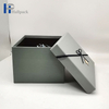Los complementos personalizados profesionales perfuman la caja de papel gris