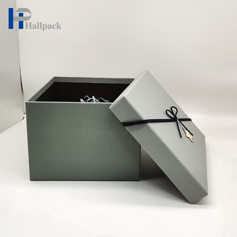 Los complementos personalizados profesionales perfuman la caja de papel gris
