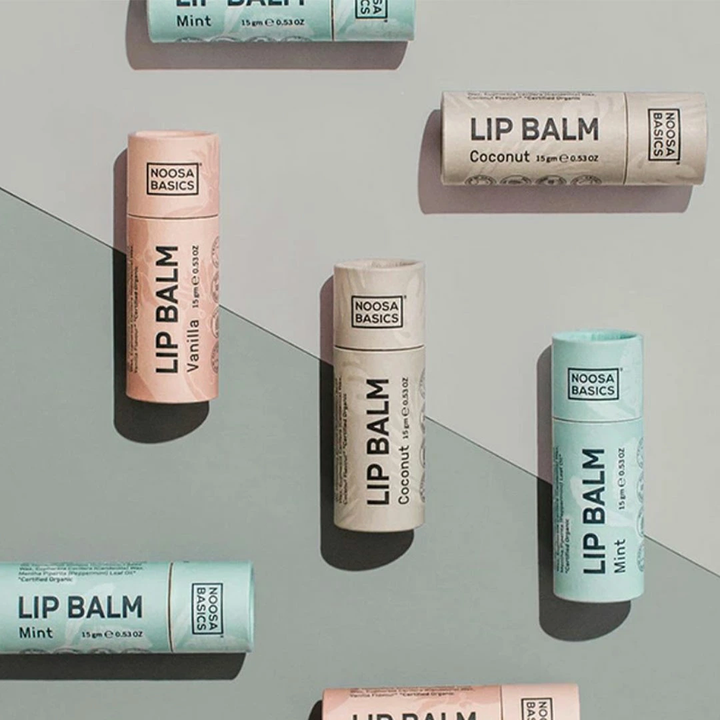 Papel empaquetado de cartón redondo cosmético personalizado respetuoso del medio ambiente del tubo empaquetado para empujar hacia arriba el protector labial desodorante