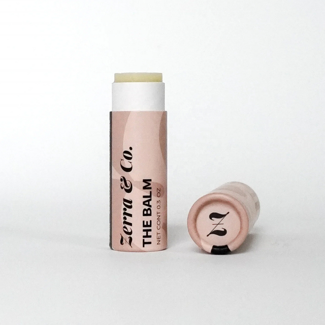 El lustre del labio del protector labial de la cartulina biodegradable reciclada empuja hacia arriba el tubo cosmético respetuoso del medio ambiente del tubo de papel