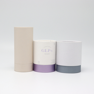 Paquete de tubo redondo empaquetado en cartón cosmético personalizado de alta calidad para botella de perfume de aceite esencial