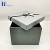 Los complementos personalizados profesionales perfuman la caja de papel gris
