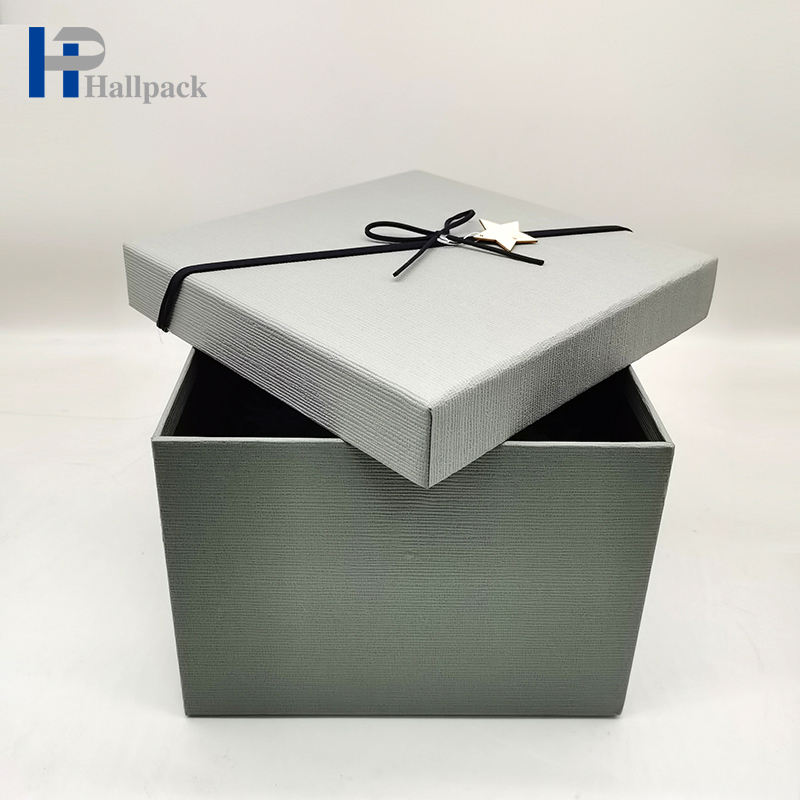 Los complementos personalizados profesionales perfuman la caja de papel gris