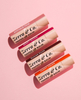 El lustre del labio del protector labial de la cartulina biodegradable reciclada empuja hacia arriba el tubo cosmético respetuoso del medio ambiente del tubo de papel