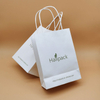 Paquete de tamaño personalizado Bolsa de papel con asa de papel Bolsa de compras de papel Kraft